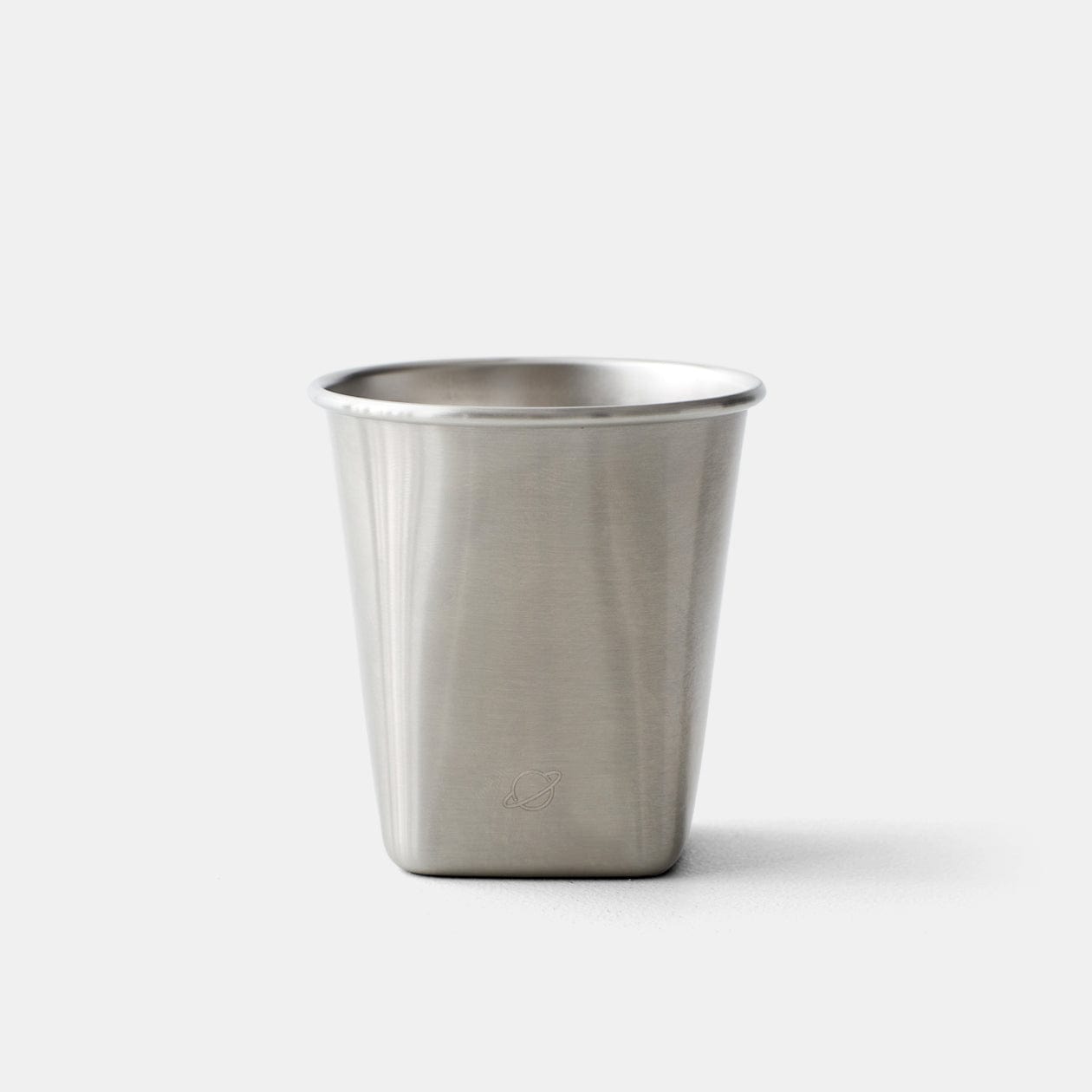 Front view of stainless steel cup on White/Gray background.