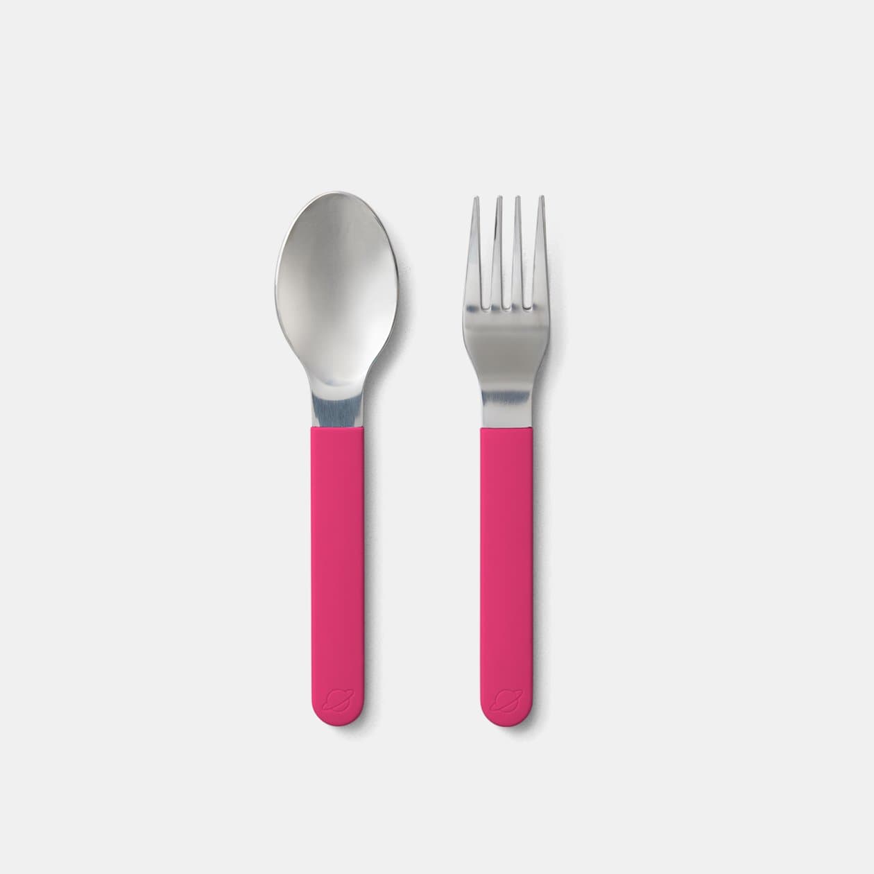 color::Raspberry | PlanetBox Magnetic Utensils set featuring spoon and fork side by side with Raspberry colored silicone grips.